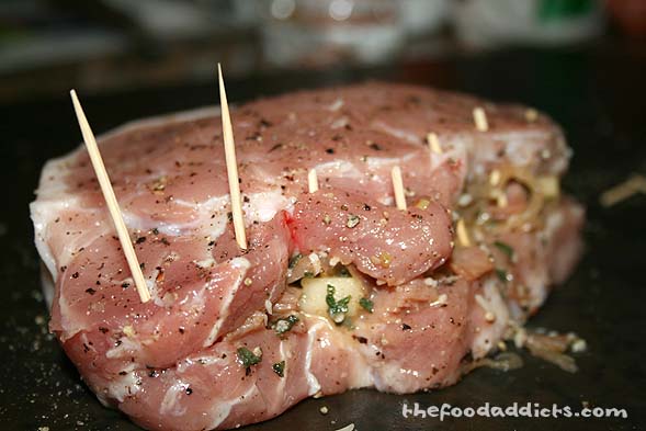 To keep the pork chops closed and the stuffing from falling out, we used toothpicks to hold them in place. You can also use skewers.