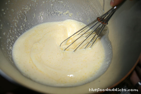 In a mixing bowl, whisk together the milk, water, melted butter, and eggs. In another bowl, mix together the flour and salt. Then whisk the milk mixture into the flour. Strain batter and refrigerate for about an hour.