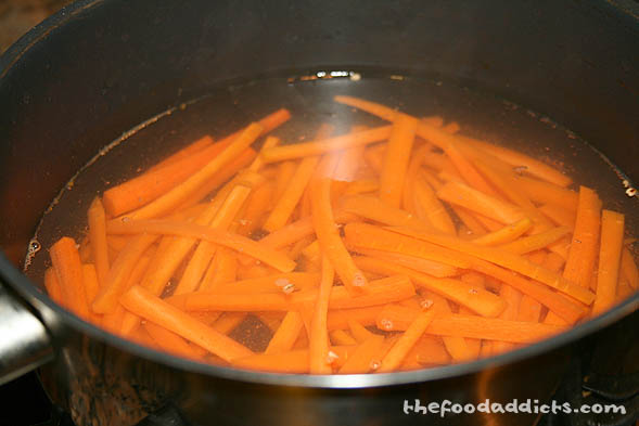 We wanted to add a side of vegetables with our fish, so we made honey-ginger carrots. Julienne the carrots and blanch them in boiling water for about 5-7 minutes until soft. 