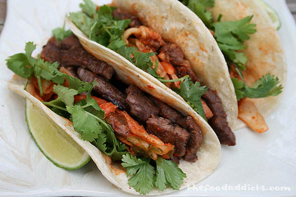 To make our Korean-Mexican tacos, we packed the corn tortillas with the marinated and grilled beef short ribs, kimchi (which we bought at the market), cilantro, and a squeeze of lime. The meat was tender, juicy, and full of flavor and the kimchi gave it a fresh and crisp texture. It may not be as good as Kogi's, but then again, we don't know any better until we try it! 