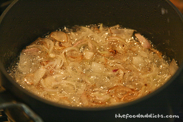 One of the toppings for this noodle dish is fried shallots, so we used about 1/2 cup of thinly sliced shallots and deep fried them until golden brown.